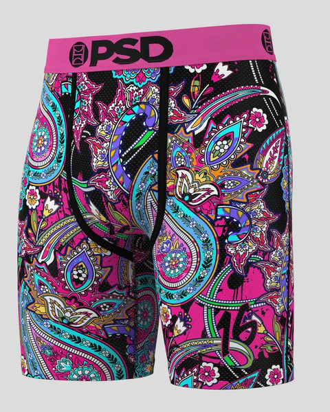 PSD brand boxer briefs with bright pink waistband and colorful paisley floral pattern on black fabric.