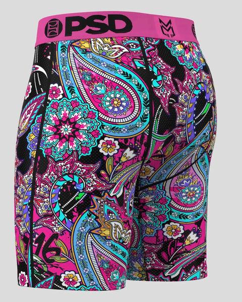 PSD brand men's boxer shorts with pink waistband and multicolored paisley floral pattern on black background.