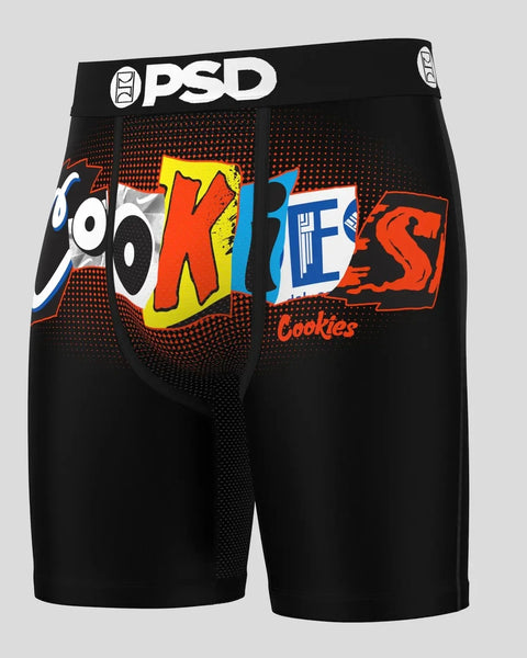 Black PSD boxer shorts with colorful "Cookies Ransom" graphic print and mesh panels on front.