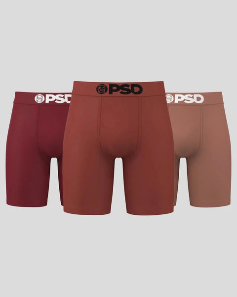 Three PSD boxer briefs in burgundy, rust, and tan with branded waistbands.