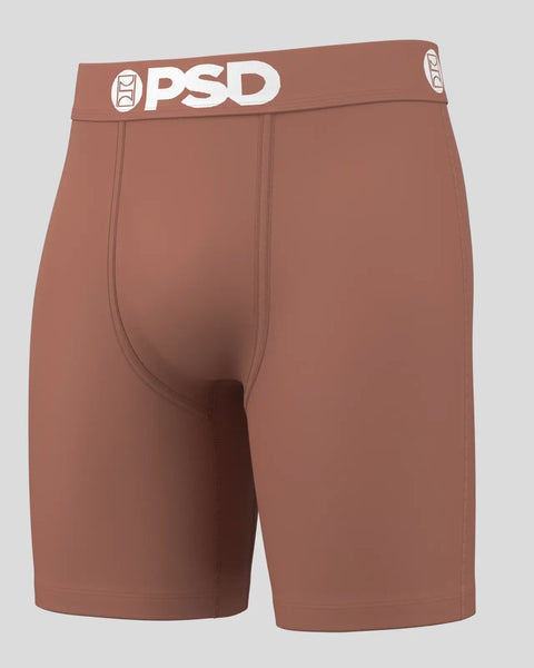 Terracotta PSD boxer briefs with white logo waistband and center seam detail.