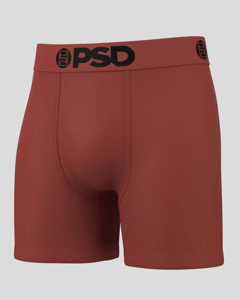 Terracotta-colored boxer briefs with black PSD waistband and logo detail.