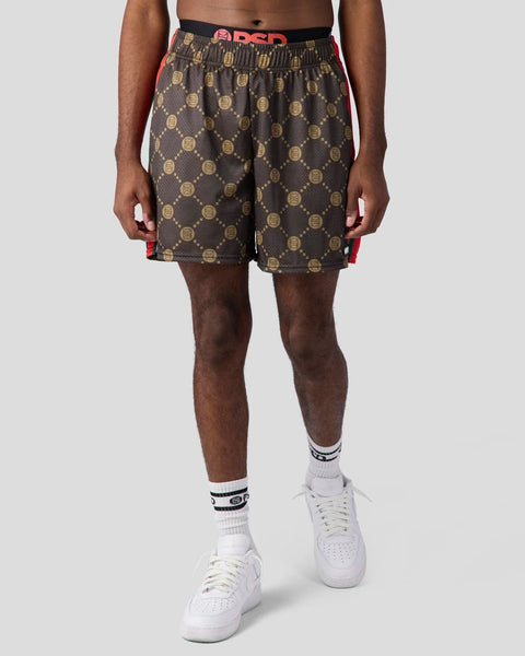 Brown shorts with gold circular emblem pattern, elastic waistband with red side stripe and branding.