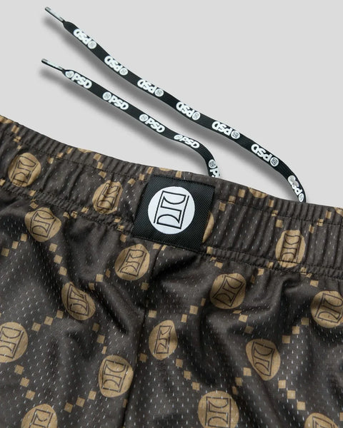 Brown active short with geometric print pattern, adjustable drawstring waistband with branded label and logo patch.