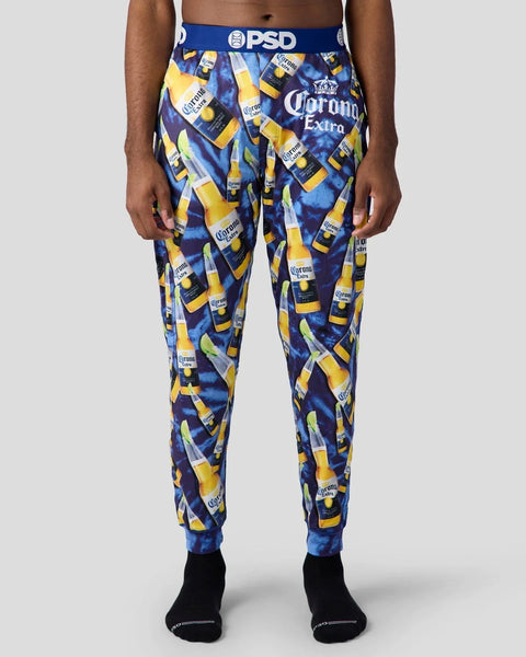 Men's blue lounge pants with Corona Extra beer bottle print and PSD waistband.