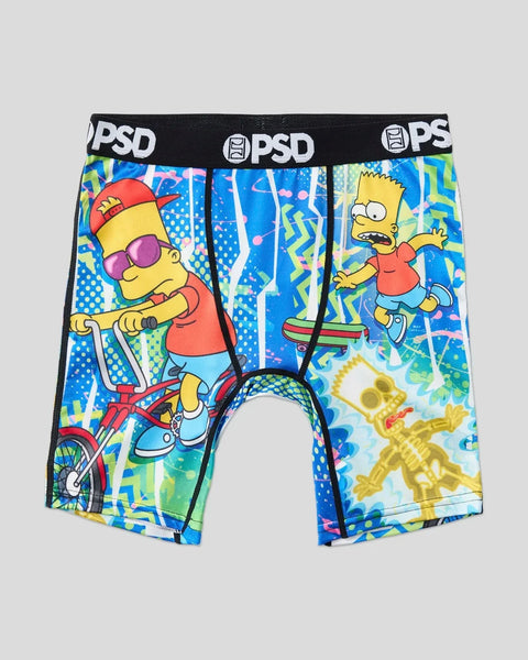 PSD brand boxer briefs featuring Bart Simpson characters and colorful geometric patterns on blue background.