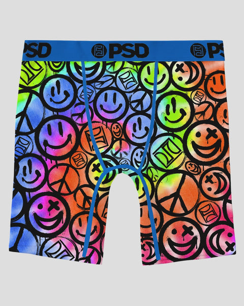 Boxer briefs with multicolored smiley faces, peace signs, and cartoon graphics on black background with blue PSD waistband.