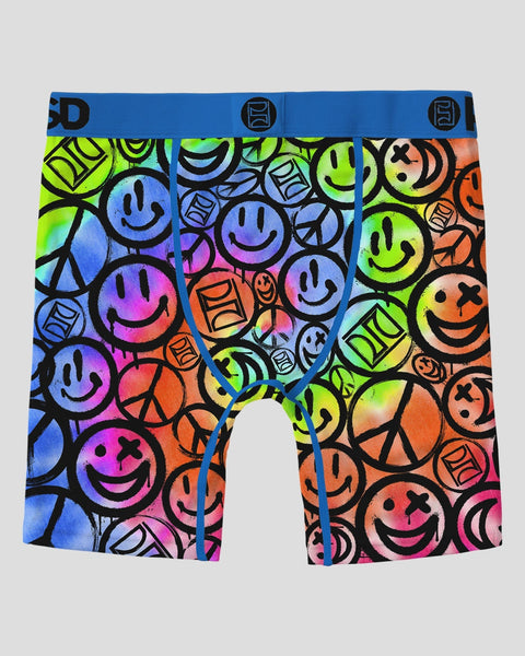 Colorful boxer briefs with rainbow gradient smiley faces, peace signs, and geometric patterns on black background with blue w
