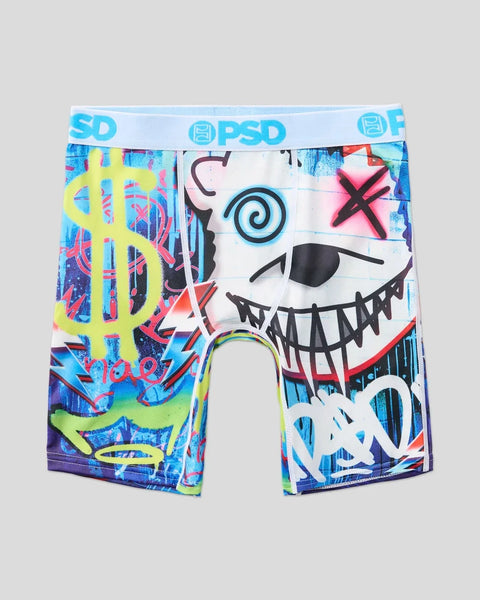 Colorful PSD boxer briefs with dollar sign, skeletal face, and graffiti-style graphics on blue and neon background.