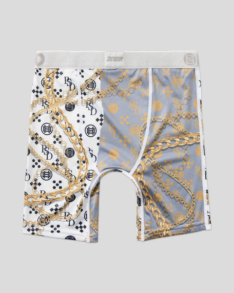 Men's boxer briefs with split design featuring gold chain and logo patterns on white and blue sections.
