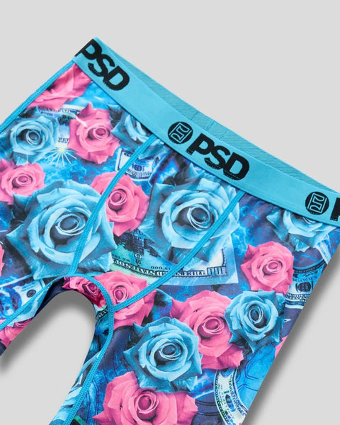 Bright blue and pink rose print underwear with blue waistband and PSD branding.