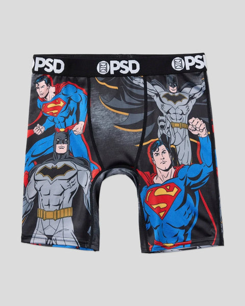 Black PSD boxer briefs with Superman and Batman characters in blue, red, and gray across front and back panels.