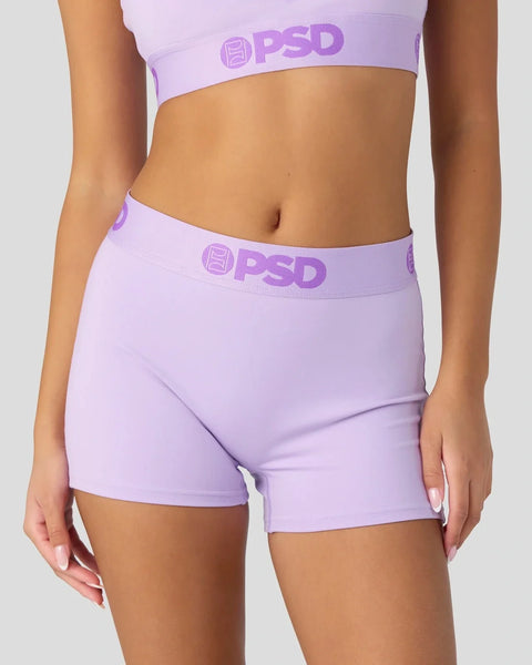 Lavender sports bra and shorts set with PSD branding on elastic waistbands.
