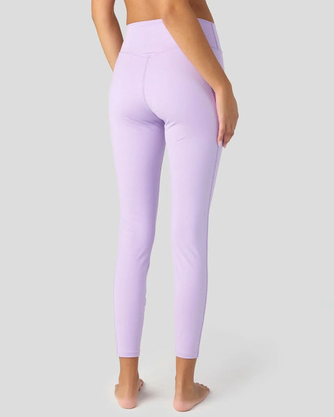 Lavender high-waisted leggings with full-length coverage and side seams shown from back view.