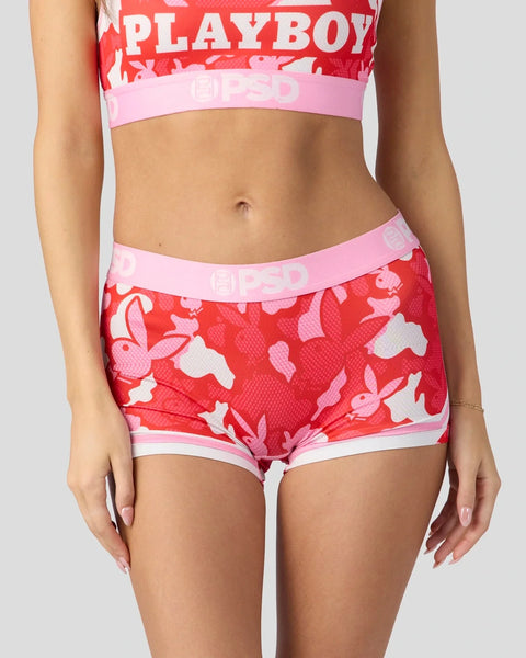 Red and pink camouflage bra top and shorts set with Playboy branding and pink elastic waistbands.