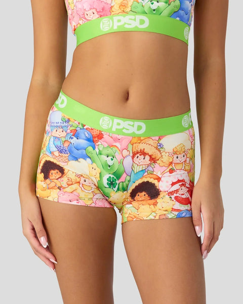 PSD sports bra and shorts set with Strawberry Shortcake and Care Bears characters in pink, yellow, and green.