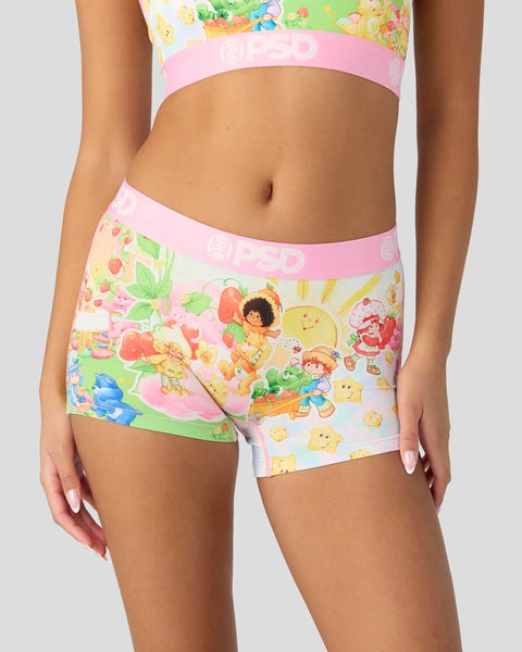 Pink waistband shorts with Strawberry Shortcake and Care Bears characters printed on white and pastel colored fabric.