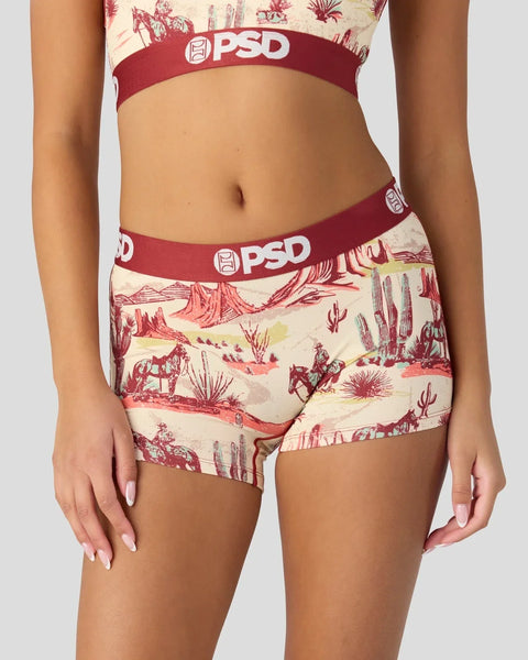 PSD bra and shorts set with cream and burgundy ranch-themed print featuring cacti, horses, and desert landscape.