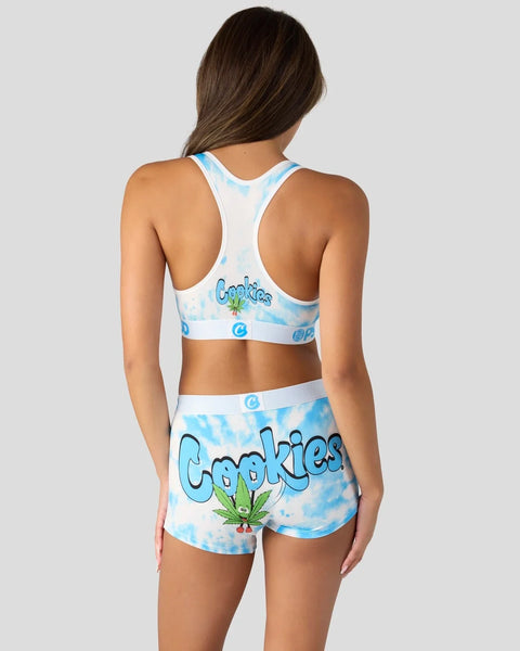 Woman wearing blue and white tie-dye two-piece set with 