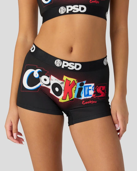 Black PSD boxer shorts with colorful "Cookies" logo and text on front panel.