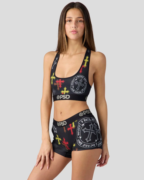 Black sports bra and shorts set with colorful cross designs and circular text graphics.