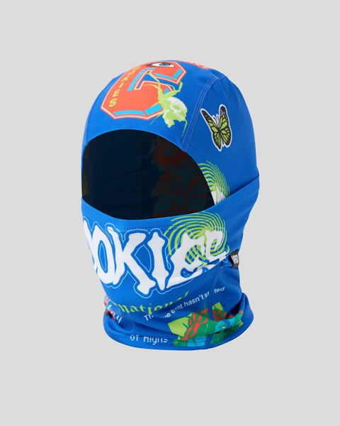 Blue balaclava with colorful graphic prints including butterflies, text, and abstract designs.