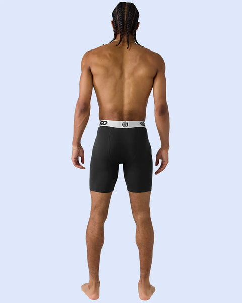 Black modal boxer briefs with silver-toned waistband, shown on model from back view.