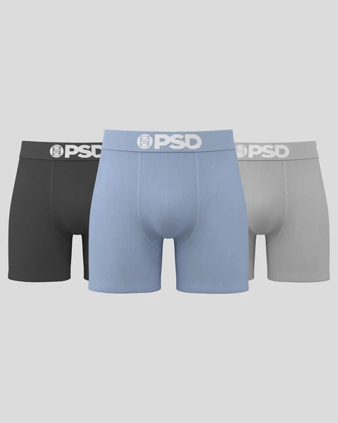 Three PSD brand boxer briefs in black, light blue, and gray with white waistbands.