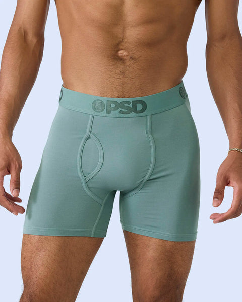 Sage green modal boxer briefs with PSD brand waistband and contoured pouch on model.