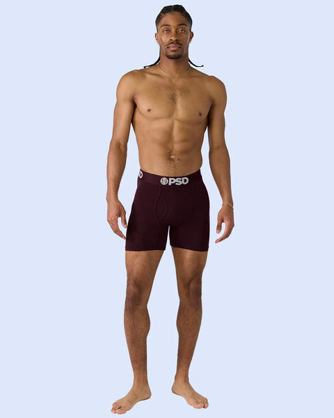 Man wearing dark maroon modal boxer briefs with PSD waistband.