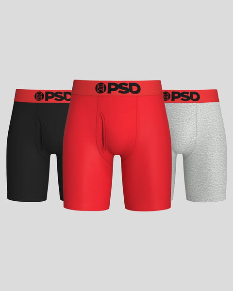Three PSD boxer briefs with red waistbands in black, red, and grey.