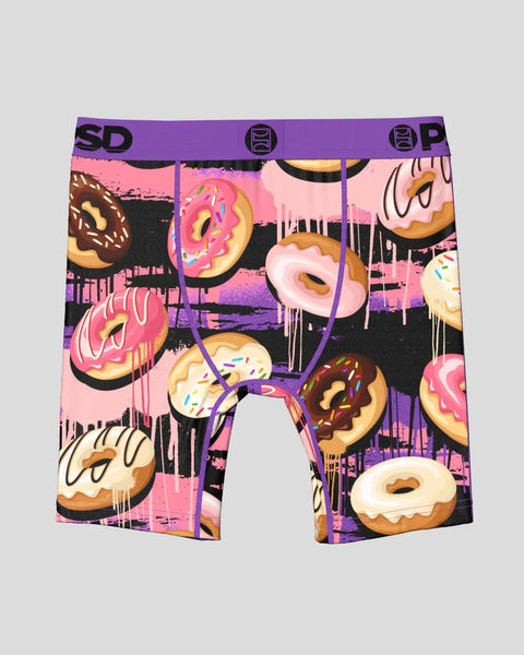 Boxer briefs with purple waistband featuring colorful donuts with dripping frosting and sprinkles on pink and black backgroun