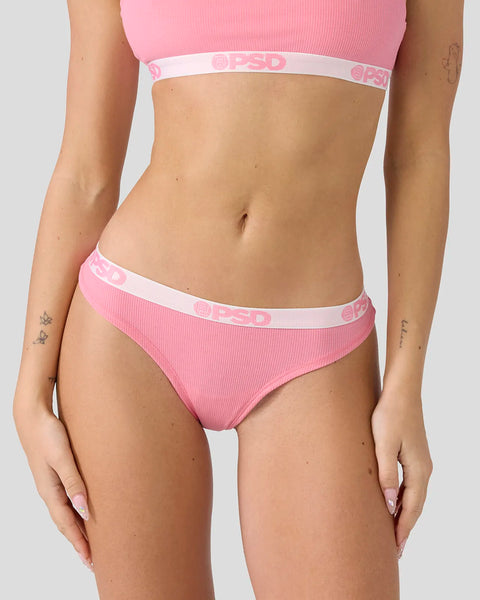 Pink ribbed crop top and matching briefs with white waistbands and brand text.