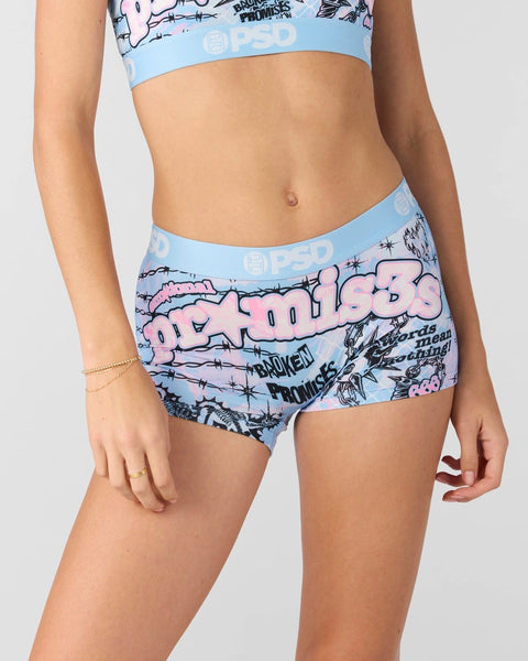 Light blue and pink graphic print boy shorts with barbed wire and text design featuring blue elastic waistband.