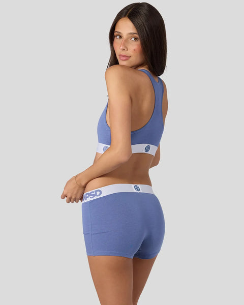 Blue denim modal sports bra and shorts set with white waistband trim.