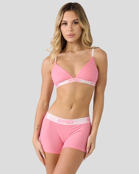 Baby pink ribbed bra and shorts set with spaghetti straps and elastic waistband trim.