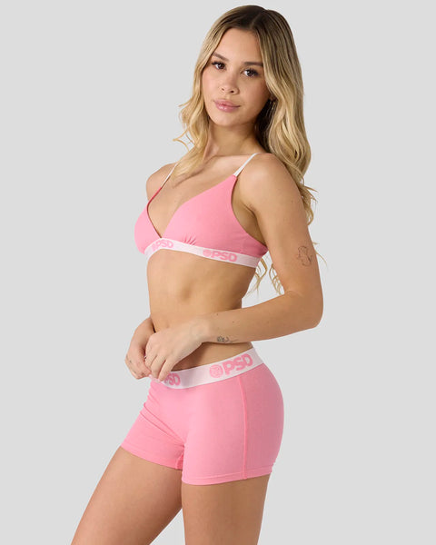 Baby pink ribbed two-piece set with triangle bra top and shorts, featuring white trim and logo waistband.