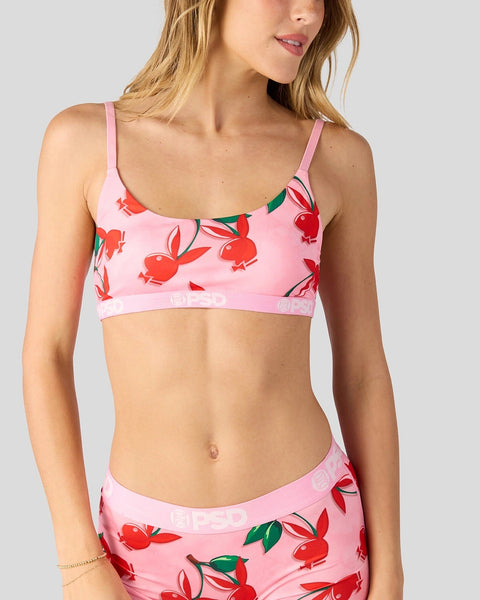 Pink crop top bikini with red cherry and green leaf print, thin shoulder straps and branded elastic band.