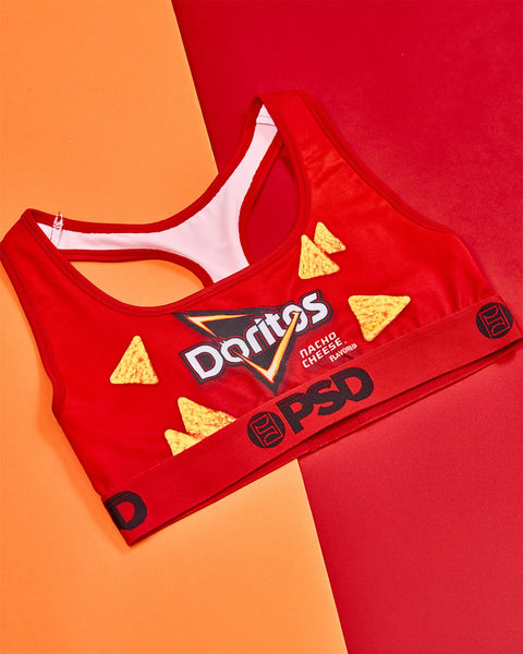 Red sports bra with Doritos Nacho Cheese branding and yellow triangle chip graphics printed on front.