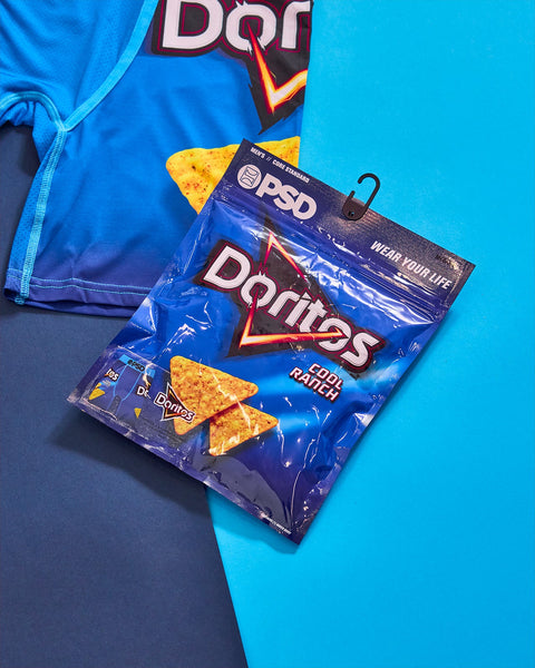 Three snack packages displayed on a blue and gray background: Doritos Cool Ranch and two additional chip varieties in blue pa