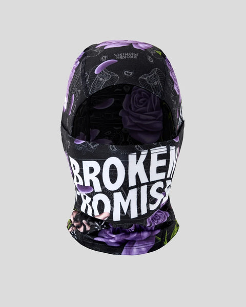 Black and purple balaclava with "Broken Promises" text, rose graphics, and celestial design throughout.