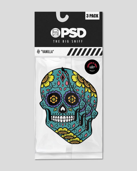 Three-pack of vanilla-scented air fresheners featuring turquoise candy skull design with yellow flowers and purple details.