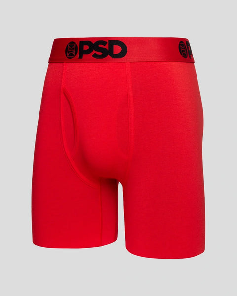 Red modal boxer briefs with black PSD branding on elastic waistband.