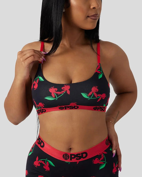 Black modal bralette with red cherry and green leaf print, red straps and red branded waistband.