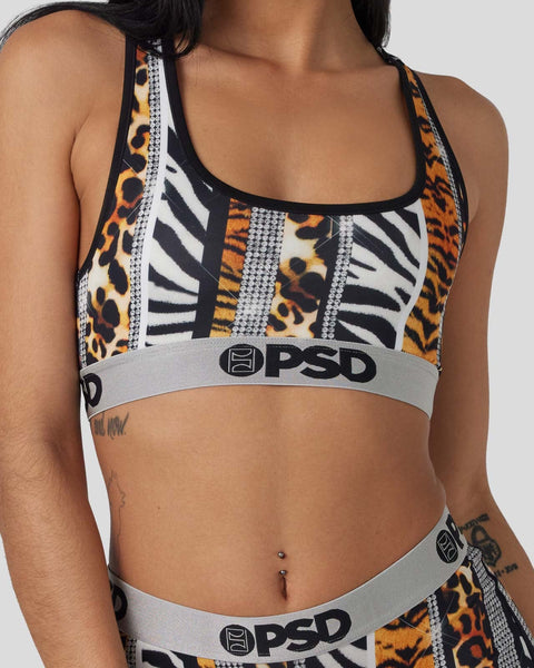 Sports bra with mixed animal print panels in leopard, zebra, and tiger stripes with gray rhinestone accents and gray PSD wais