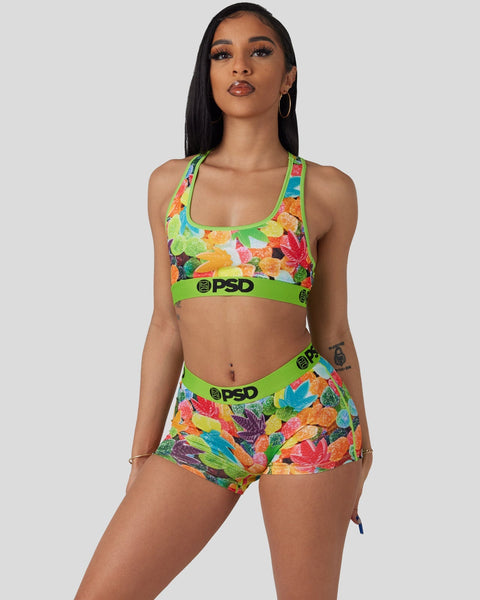Colorful candy-print sports bra and shorts set with lime green trim and PSD branding.