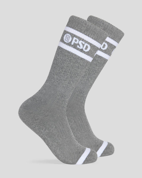Two gray crew socks with white stripes and logo text at the calf.
