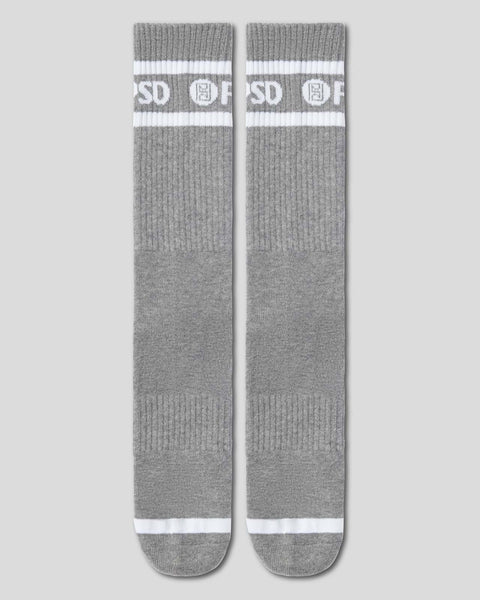 Two gray crew socks with white horizontal stripes and logo badges on the upper calf.