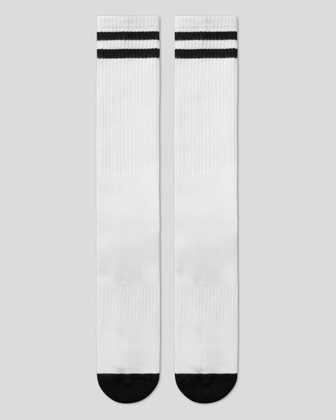 Pair of white crew socks with black stripes at the cuff and black toe and heel sections.