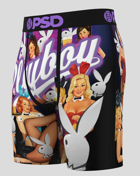 PSD boxer briefs with Playboy Afterhours print featuring vintage pin-up imagery and white bunny logo on black background.